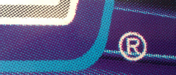 A close-up of the Pepsi advertisement showing the poor effects of anti-aliasing on type
