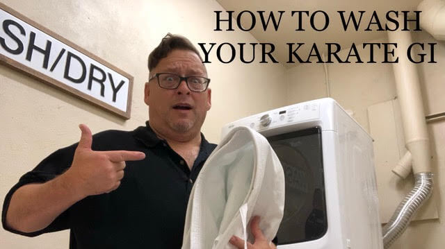Sensei Albert with his gi in front of a washing machine
